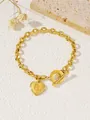 Gouden titanium stalen kettingarmband met hartvormige hanger en letter B bedeltje - Hart Letter B / Goud