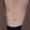 Polished gold ball pendant with shimmering twist chain necklace for women - Pearl Necklace / Gold
