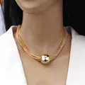 Layered gold snake chain necklace featuring a bold polished metal ball pendant for women - Ball Multi-layer Necklace / Gold