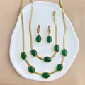 Flat snake chain jewelry set with emerald green oval gemstones in gold finish - Emerald Green Necklace Bracelet And Earrings Set