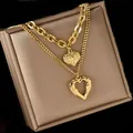 Double-layered gold titanium steel necklace with heart pendants and textured chains - Gold