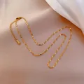 Elegant gold water ripple chain necklace with lobster clasp on soft silk fabric - Lip Chain (Chain Only) / Gold