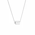Macro shot of silver cube pendant with smile engraving on sleek stainless steel chain - Steel
