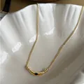 Vintage gold titanium necklace with black stone inlay on curved tube pendant - Black Agate Necklace