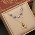 Gold layered evil eye necklace featuring blue beads and radiant fringe pendant finish - Double Layer Necklace