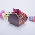 Exquisite curved gift box with geometric patterns and a dark red satin ribbon bow - Colorful Triangle