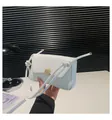 White faux leather baguette bag with golden metal lock and twisted knot strap detail - White