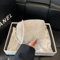 Mini hand-woven crossbody bag in off-white finish with slim shoulder strap - White