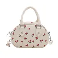 Creamy white cherry print boston handbag with adjustable shoulder straps and top handles - White