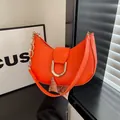 Minimalist bright orange half-moon underarm bag with gold horseshoe buckle and chain strap - Orange Red / 21.5