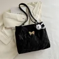 Black crinkle tote bag with silver butterfly and white plush monster charm accessory - With Ornament / Black