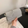Sparkly silver glitter evening clutch bag with rectangular flap and fine shoulder strap - Silver