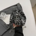 Sac seau chic à paillettes argentées, cordon de serrage, perle et bandoulière chaîne - Argent