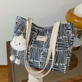Blue and white geometric woven tote bag with leather strap and cloud pendant - Blue with Pendant