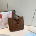 Dark brown corduroy tote bag with strawberry pattern and convenient front pocket - Brown