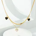 Collana doppia in oro con catena piatta a serpente e ciondolo a cuore in madreperla - Collana a Cuore Bianco e Nero / Oro