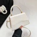 Sac à main en cuir blanc crème avec motif marbré jaune et anse tressée - Blanc Cassé