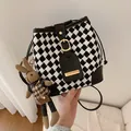 Retro black and white houndstooth bucket bag with leather drawstring and rabbit charm - With Ornament / Black