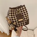 Vintage houndstooth bucket bag in brown with adjustable leather strap and rabbit charm - With Ornament / Brown