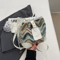 Retro wave pattern bucket bag in wool texture with white faux leather trim and strap - Off White