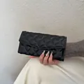 Chic black quilted faux leather long wallet with elegant diamond stitch pattern - Black