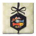 Close-up of a hexagonal gift tag with koi fish patterns and a golden Fu character - Abundance Every Year / 4.1*4.7cm