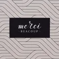 Macro shot of rectangular adhesive labels with merci beaucoup text on textured surface - Black Background Handwriting (HB30020) / 5x2.5cm