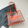 Bright orange transparent PVC tote bag with leather straps and interior pouch - Orange