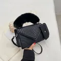 Black V-quilted handbag with faux fur handle and detachable mini coin purse - Black