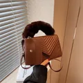 Brown quilted crossbody handbag with a plush handle and matching mini pouch accessory - Coffee
