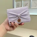 Portefeuille tricolore chic en cuir verni lavande avec grand nœud et pendentif doré - Violet