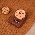 Close-up of brown leather wallet featuring a 3D plush cookie character and Sweet embroidery - Cookie Sandwich Character