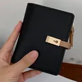 Short black bifold PU leather wallet for women with golden keyhole buckle and zipper - Black