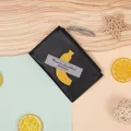 Black PU leather coin purse with banana patch and zipper closure for women - Black