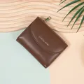 Brown faux leather mini wallet for women featuring classic star print and silver zipper - Coffee