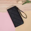 Elegant black quilted long wallet for women with zipper closure and wrist strap - Black
