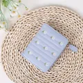 Short two-fold light blue wallet with daisy embroidery and zipper closure for women - Blue