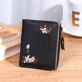 Short black faux leather wallet with cat embroidery and golden zipper for women - Black