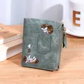 Slim light green coin purse featuring exquisite cat embroidery and gold zipper detail - Dark Green