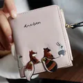 Short pink zippered wallet for women with cute animal embroidery and tassel zipper - Pink