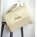 Chic cream white women's compact wallet with textured fabric and leather wrist strap - White