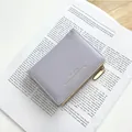 Minimalist light purple leather wallet for women with golden zipper and chic embossing - Purple