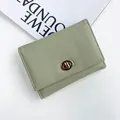 Portafoglio giapponese verde fagiolo in pelle martellata con chiusura girevole oro - Verde