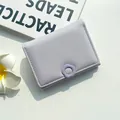 Portefeuille court à trois volets en cuir PU lilas avec bouton pression floral et design épuré - Violet