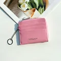 Portacarte rosa in pelle sintetica con fessure multiple, zip e portachiavi argento - Rosa