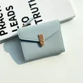 Light blue compact folding wallet with litchi grain texture and gold metal buckle - Blue