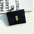 Women's short black litchi pattern leather wallet with gold lock and V-stitch detail - Black