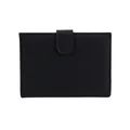 Minimalist black lychee leather passport wallet with a secure strap closure for travel - Black