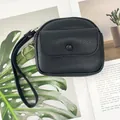 Black lychee pattern mini coin purse with adjustable wrist strap and metal keyring - Black