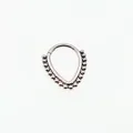 Polished stainless steel teardrop clicker ring with decorative beaded outer edge - Steel